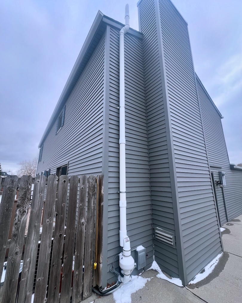 radon mitigation system gray house